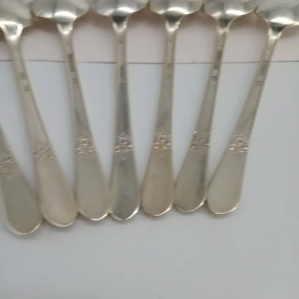 7X Tsp Rogers Bros ADORATION International SilverPlate Teaspoons Silver plated